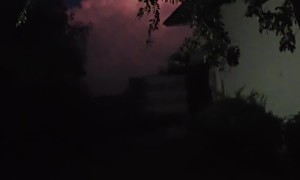 Lightning Flashes Within Giant Cloud Column