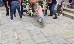 Saint Falls During Procession