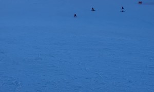 Young Skier Somersaults Off Slope