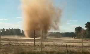Dust Devil Vortexes Merge