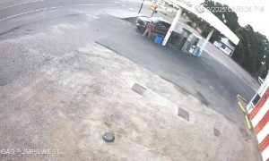 Man at Gas Station Narrowly Avoids Getting Hit by Out-of-Control Vehicle