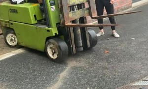 Driving Forklift Up a Trailer Ramp