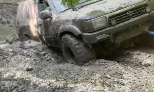 Car Pulled Out Of Deep Mud