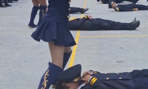 Respectful Boy Covers Face During Dance Routine