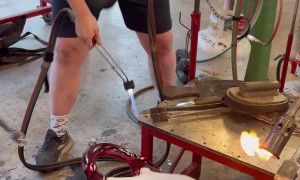 Artist Blows Glass Bag Holding Itself