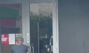 Push Sign on a Pull Door