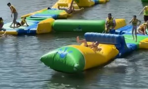 Dad Launches Daughter On Waterpark Blob