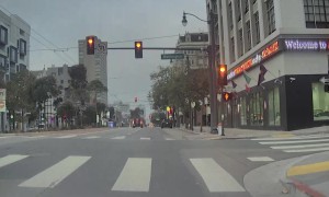 Car Runs Redlight and Has a Close Call With Crossing Pedestrian