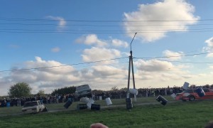 Limousine Knocks Down Car Towers