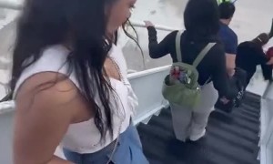 Traveler Falls Down Airplane Stairs