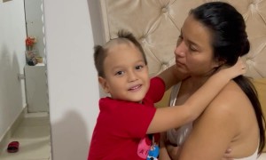 Boy Shaves Head and Shows His Mom