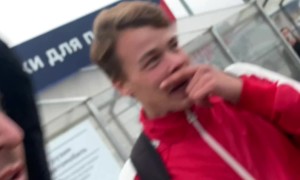 Guy Stands Close To Burning Car