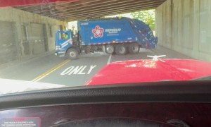 Garbage Truck Stuck in a Tunnel