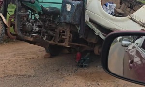 Drunk Motorcyclist Towing a Car