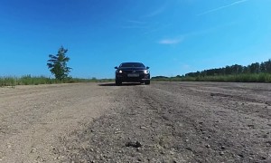 Man Climbs on His Car While Driving