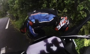 Motorcycle Crashes into Stopped SUV