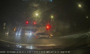 Speeding Car In The Wrong Lane Runs Red Light