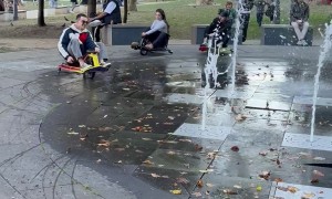 Go-Karts Zig Zag Through a Fountain