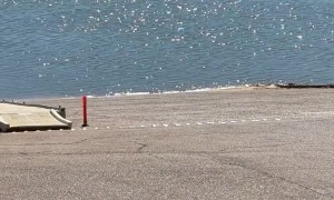 Power Plant Back Flushed a Cooling Water Pipe at Enid Lake