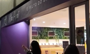 Woman Walks Into Glass of a Snack Bar