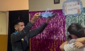 Struggling To Pop The Gender Reveal Balloon