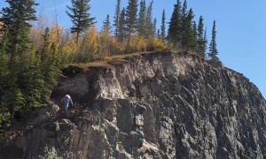 Man Chases His Dog Up Cliff