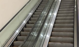 When Liquid Courage Meets a Broken Escalator