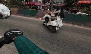 Two Women Fall From Their Scooter After Hitting Biker