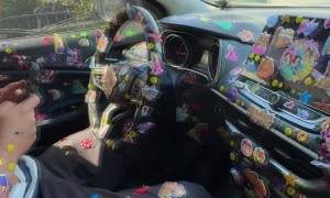 Girl Puts Stickers Everywhere