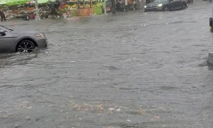 Flooded Street Traps NYC Residents In Store
