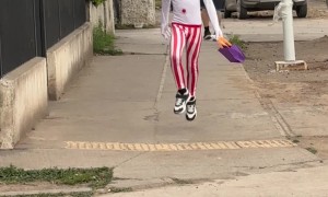 Small Creepy Clown Skips Down Street