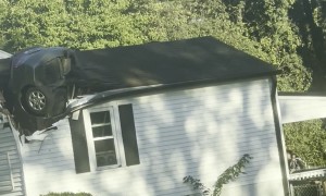 Car Crashed Vertically Through Home's Roof