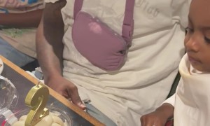 2-Year-Old Puts Out Candle With Her Hand