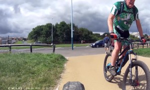 Cyclist Falls When Front Tire Bursts