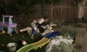 Wrestling Boys Crash Into Children's Plaything
