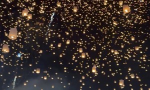 Fireworks And Sky Lanterns Cover Sky In Lights During Yi Peng Festival