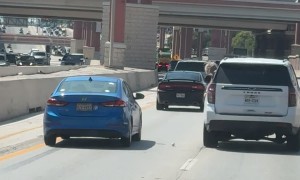 Angry Driver Throws a Bottle at Another Car