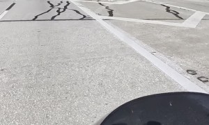 Biker Dodges Car and Dangerous Sign by an Inch