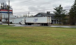 Truck Drags Concrete Barrier