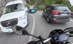 Motorcycle Overtakes Midturn and Loses Control