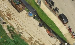 Crane Operator Saves Worker Trapped on Burning Building's Roof