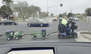 Wheelchair Pulling Train of Carts