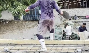 Workers Perform Stylish Flips Off Roof