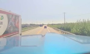 Near Miss With Semi As Woman Falls Out of Utility Vehicle