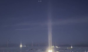 Frosty Tundra Morning Creates Light Pillars