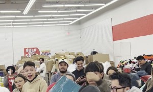 Multiple People Grab For Deeply Discounted Grill