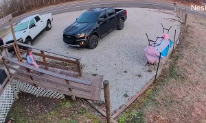 Woman Slips and Falls on Icy Ramp