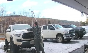 Squirrel Jumps Out From Underneath Truck Hood