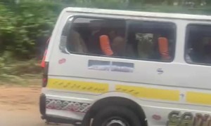 Kenyan Man Catches a Ride to Work on Roller Skates