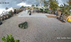 Man Knocked Off His Feet By Flying Umbrellas